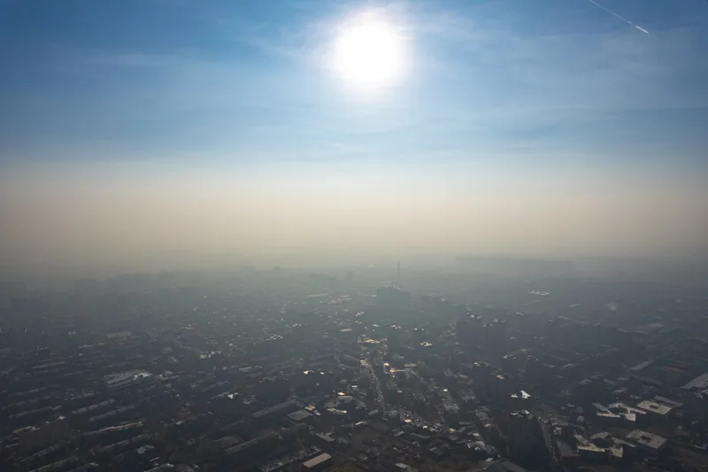 An aerial view of Yerevan engulfed in smog.
