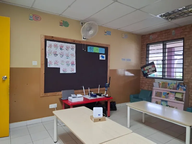 An AirGradient ONE monitor is installed in a preschool classroom to track the air children breathe every day.