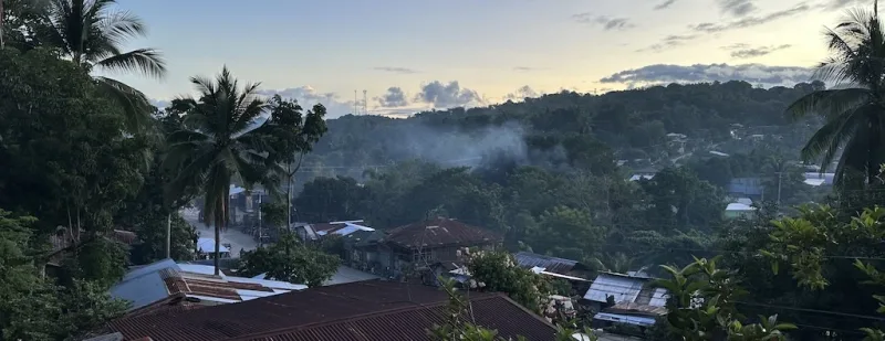 Smoke from neighbourhood trash burning.