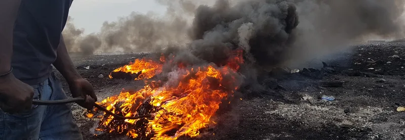 The Hidden Cost of Burning Waste in West Africa: Out of Sight, Into Our Lungs